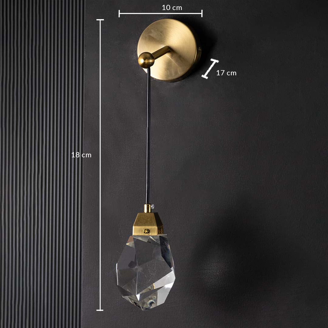 Gold and crystal pendant light displayed with measurements of 18 cm height and 10 cm base size providing clear size details for accurate placement planning.