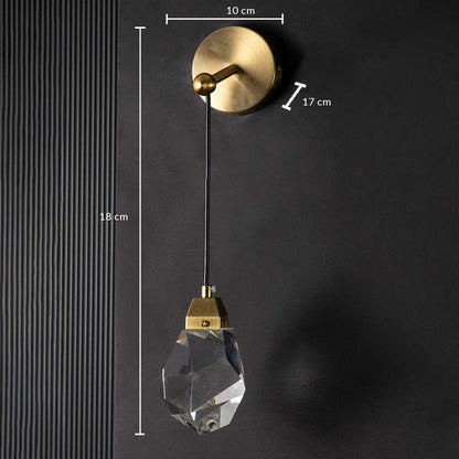 Gold and crystal pendant light displayed with measurements of 18 cm height and 10 cm base size providing clear size details for accurate placement planning.