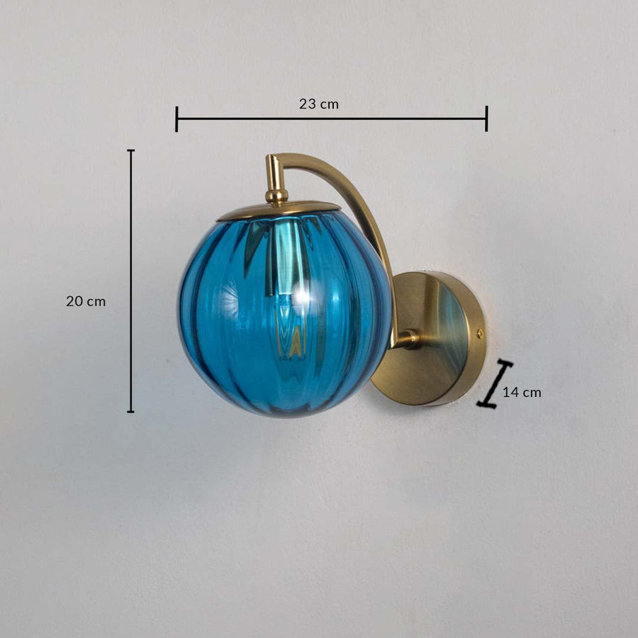 Modern brass wall light with blue glass globe measuring 26 cm height and 25 cm width for stylish interiors.