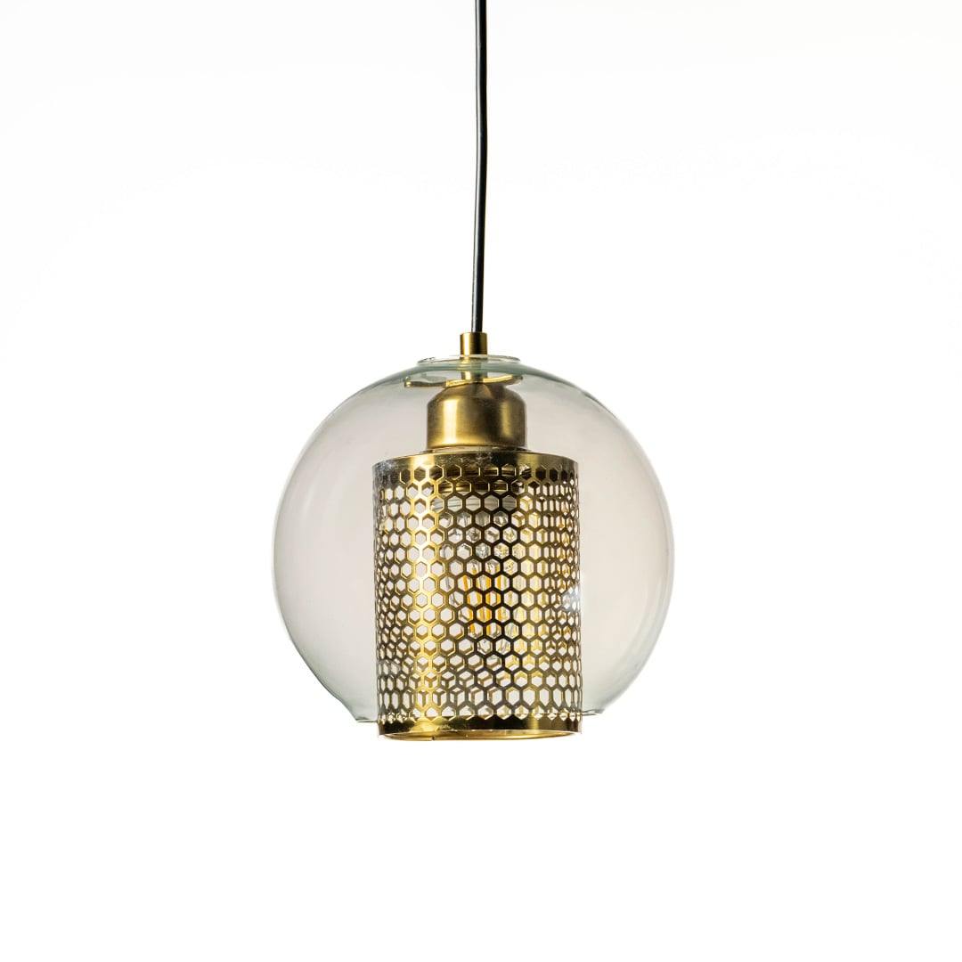 Stylish golden glass pendant light with intricate metal shade displayed on white background.