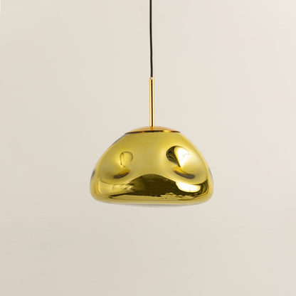 A gold metallic pendant light displayed with lights off on a white background showing its glossy curved dome form for minimalist interior styling.