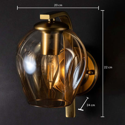 Gold wall sconce shown with dimensions clearly marked as 20 cm width 22 cm height and 24 cm depth with a sculpted glass shade on a black background.