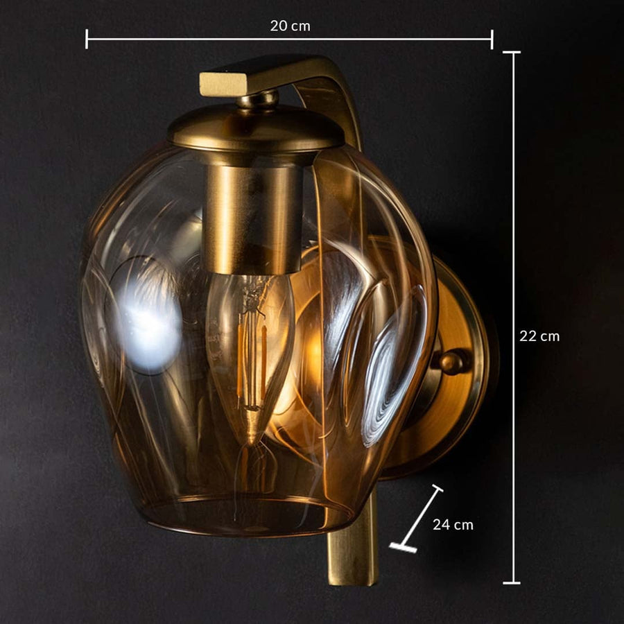 Gold wall sconce shown with dimensions clearly marked as 20 cm width 22 cm height and 24 cm depth with a sculpted glass shade on a black background.