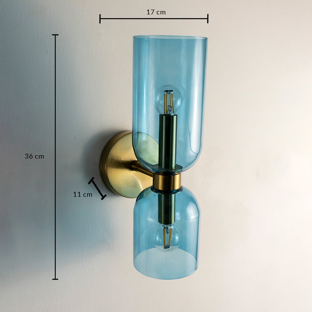 Blue glass wall light with 36 cm height and 17 cm width shown with size details perfect for elegant interiors.