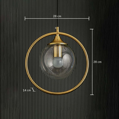 A gold ring pendant light with a clear globe shade displayed against a dark ribbed background showing full dimensions of 28 cm width 28 cm height and 14 cm depth.