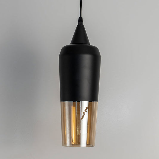 Modern black and amber glass pendant light turned off hanging against a plain white background showing the sleek design details.