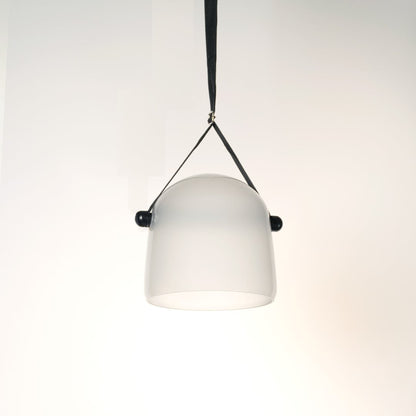 Elegant frosted white glass pendant lamp lit on white background ideal for bedroom dining and living room use.