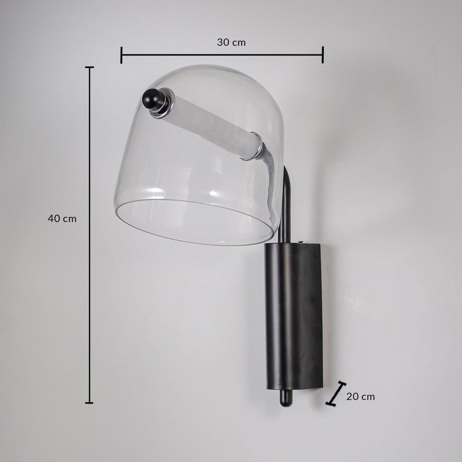 Clear glass wall lamp with black metal base dimension 40 cm height 30 cm width 20 cm depth ideal for living room lighting.