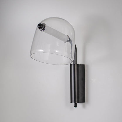Clear glass wall light with black metal base light off on white background modern wall lighting for bedroom and hallway.