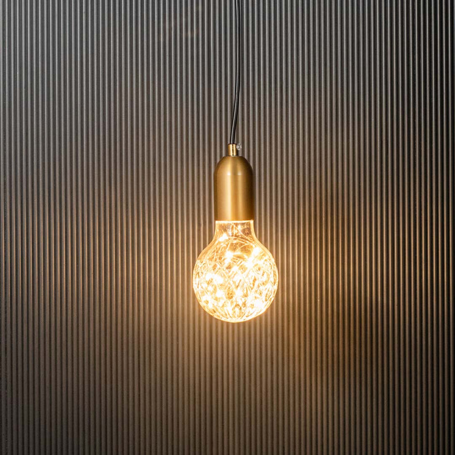 Crystal cut glass pendant lamp glowing with golden holder stylish modern ceiling light for luxury living bedroom and dining spaces.
