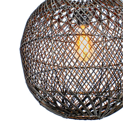 Artistic closeup view of handcrafted black rattan pendant lamp showing woven strands and bulb placement in clear detail.