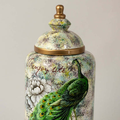 Closeup view highlighting the intricate hand-painted peacock feathers and artistic floral detailing on the decorative ceramic jar.