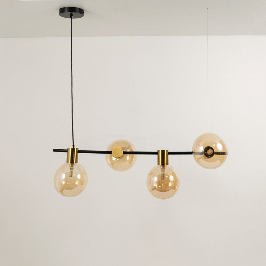 Amber glass chandelier displayed on white background with lights off showcasing geometric alignment and refined modern finish.