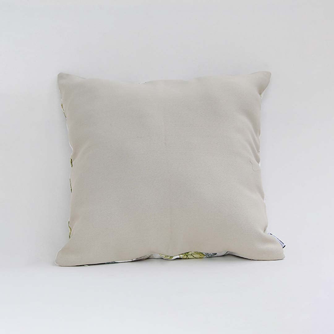 Backside of the cushion cover displayed in beige cotton fabric providing a smooth natural décor style with a breathable gentle and skin friendly texture ideal for sofas beds and interiors.