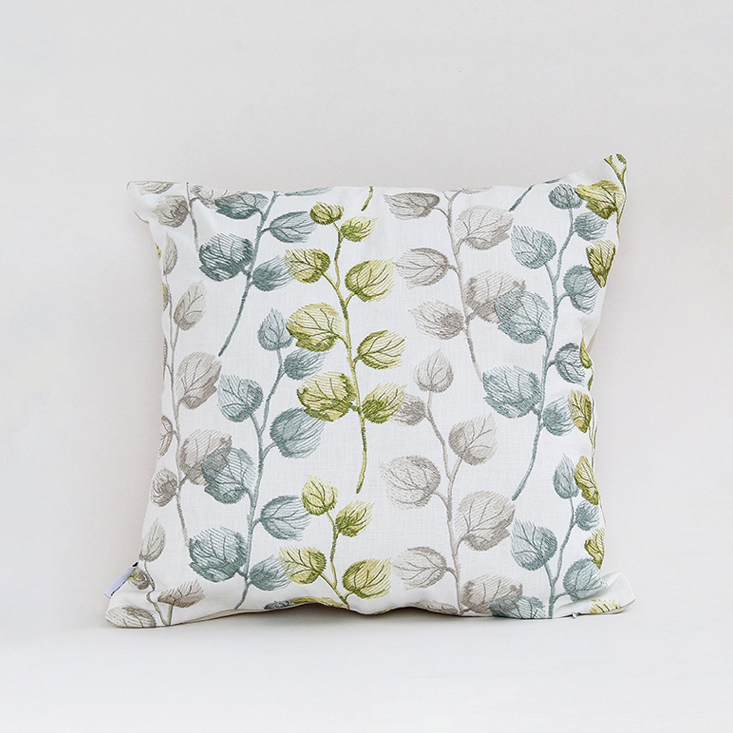 White cotton cushion cover with green berry botanical print for sofa bedroom seating and fresh modern home decor styling.