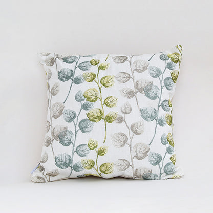 White cotton cushion cover with green berry botanical print for sofa bedroom seating and fresh modern home decor styling.
