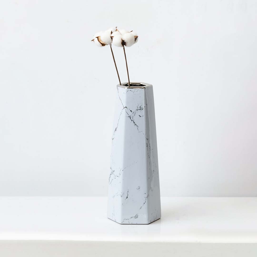 Dried cotton stem in a tall marble vase creating a soft farmhouse cotton stem décor accent ideal for rustic farmhouse styling and natural minimal home décor arrangements.