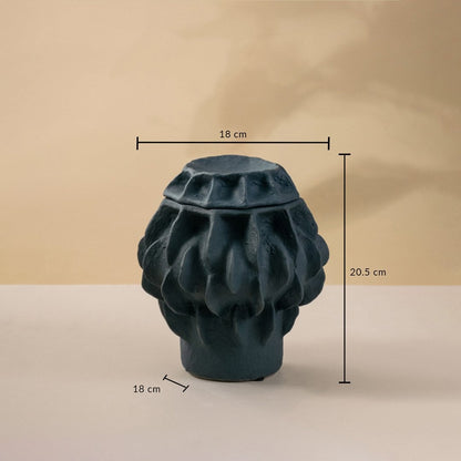 Black handcrafted ceramic vase with textured surface shown on white background measuring 20 cm in height and 18 cm in width.