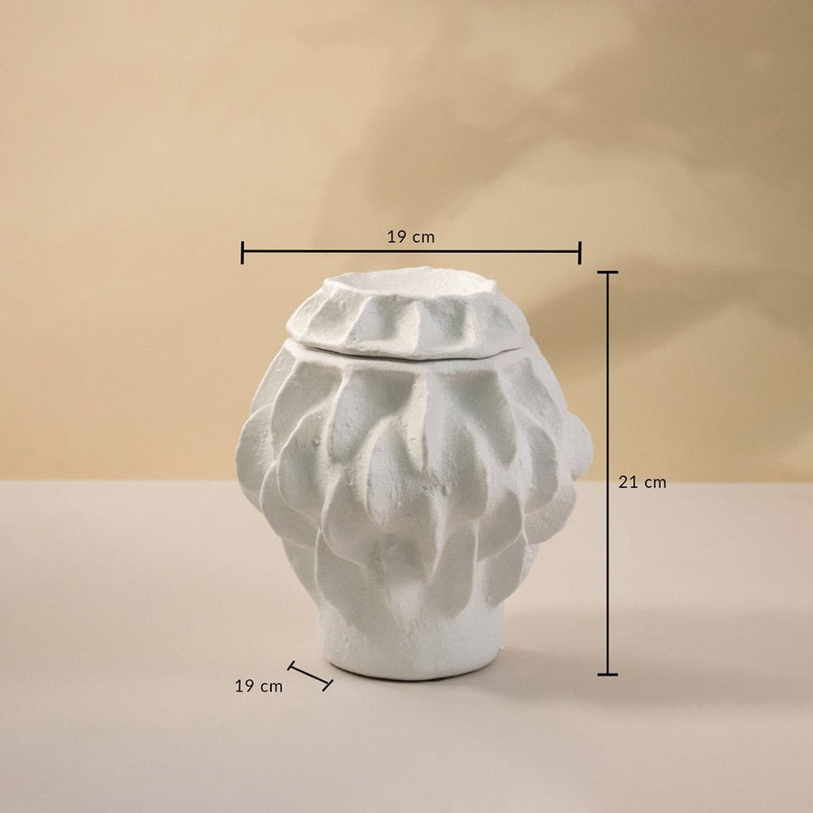 White handcrafted ceramic vase displayed on neutral surface measuring 21 cm in height and 19 cm in width.
