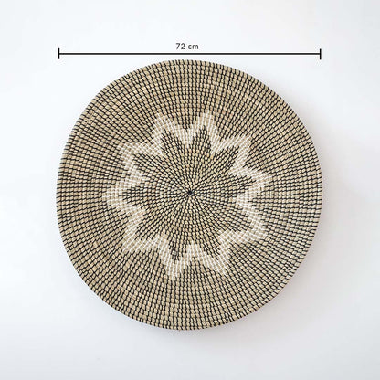 Large handwoven wicker basket wall decor in beige and black star design showing 72 cm size measurement on white.