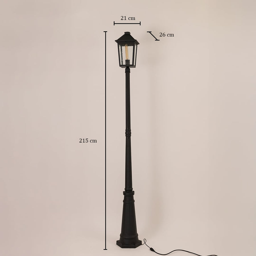 Black outdoor lamppost light with clear glass lantern shown with 215 cm height 21 cm width and 26 cm depth for classic exterior lighting.