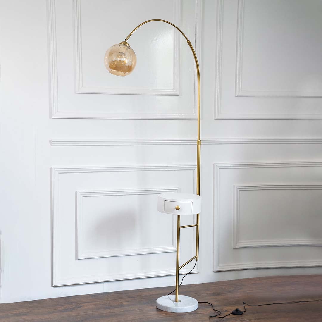 Elegant product display of a floor lamp turned off with a white globe shade standing on a clean white background with minimal decor.
