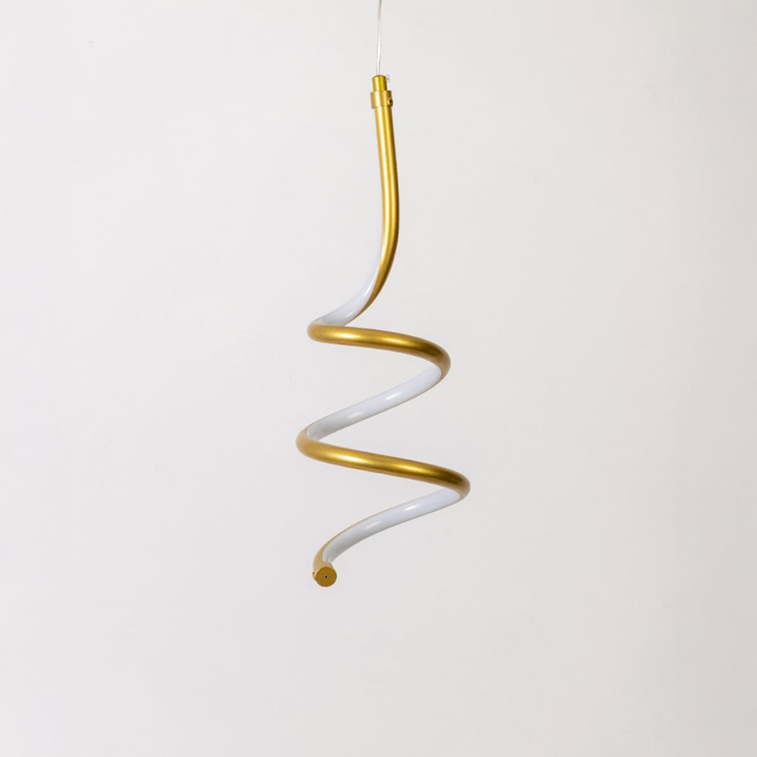 Modern gold and white metal spiral hanging light shown switched off on white background for minimal home decor.