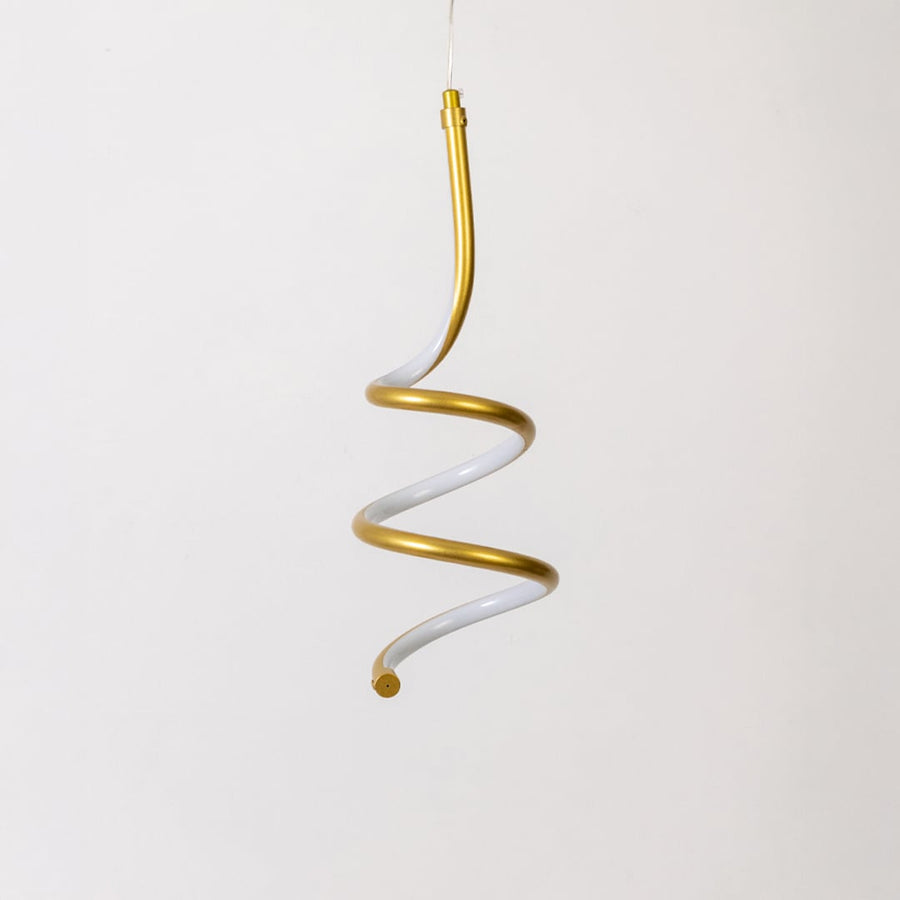 Modern gold and white metal spiral hanging light shown switched off on white background for minimal home decor.