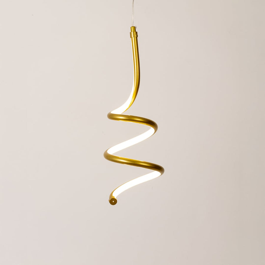 Modern gold and white metal spiral hanging light glowing softly on white background for elegant home wall decor.