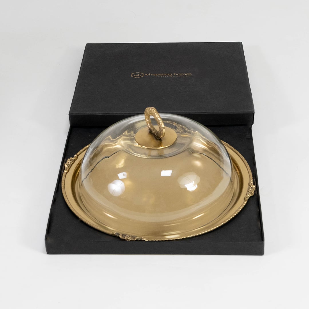 Glass dome with brass handle and tray safely packed in a premium black box for gifting and secure shipping.