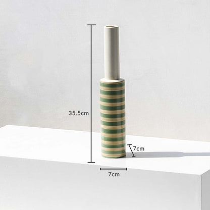 A striped decorative vase shown with dimensions marking 35.5 cm height and 7 cm width clearly displaying its slim tall structure for accurate product understanding.