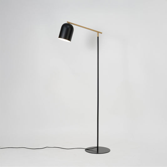 White and black metal table lamp with adjustable head for study desk bedside table on white background image.