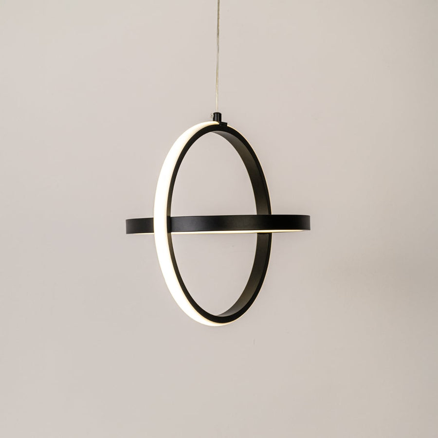 Black metal ring wall light with warm illumination for modern bedroom hallway and living room decor.