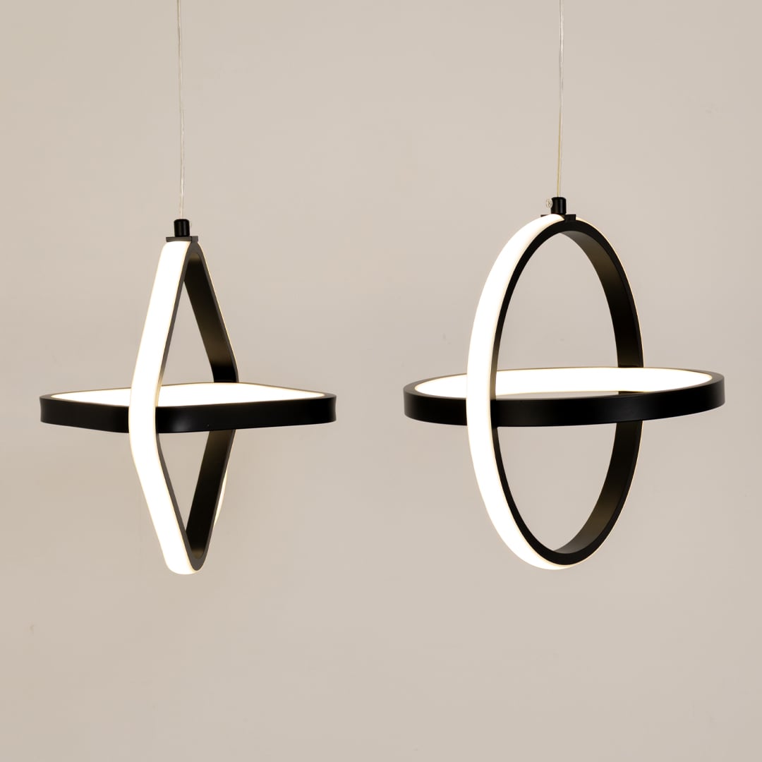 Black and white geometric LED pendant lights shown together for stylish living room dining room and modern home decor.