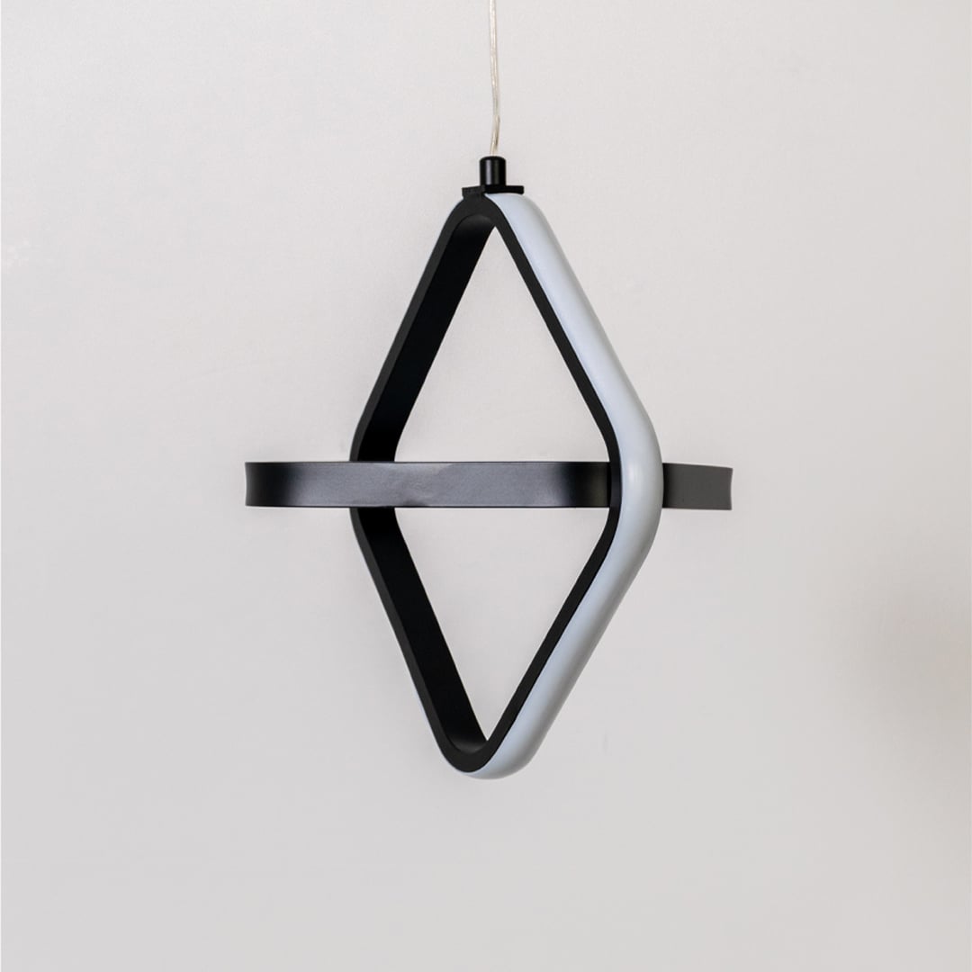 Black and white geometric LED pendant light with light off displayed on white background for kitchen dining home decor.