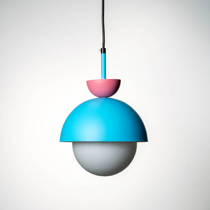 Blue metal pendant light with pink top and white diffuser designed for vibrant interiors.