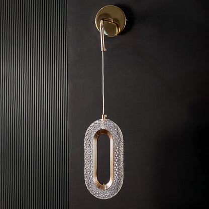 Decorative oval pendant lamp with crystal and gold design displayed unlit on black background.