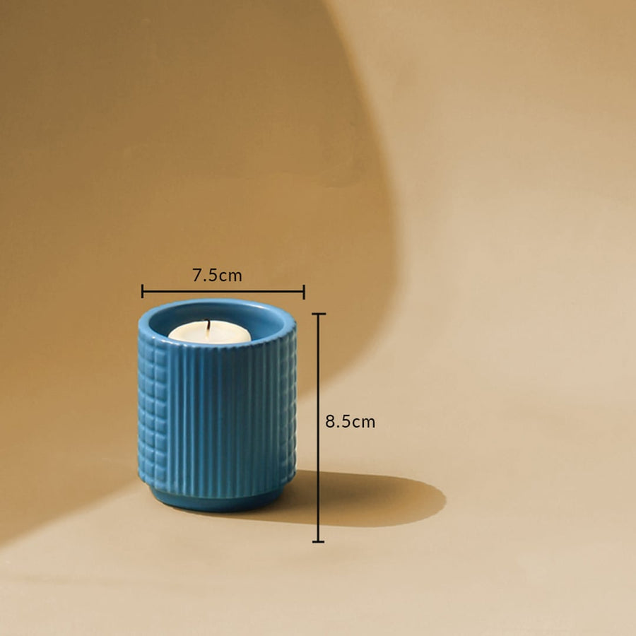 Blue textured ceramic candle holder with 8.5 cm height and 7.5 cm width shown clearly for accurate size and decor reference.
