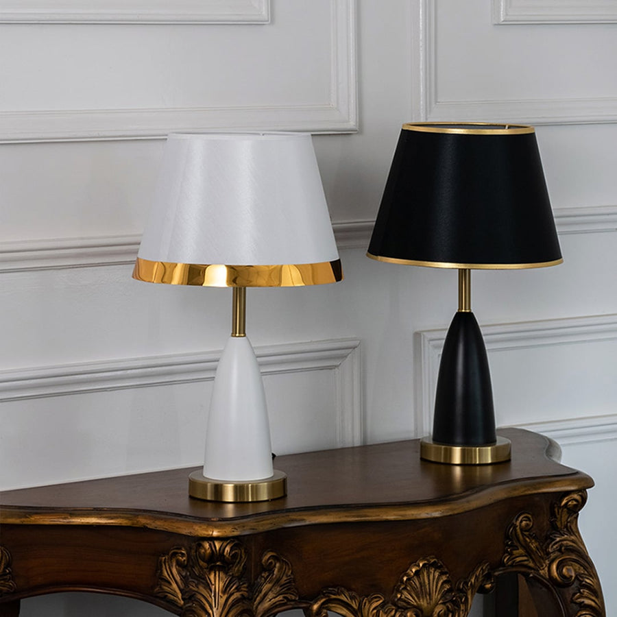Grouped white and gold table lamp styled with matching accessories to create refined luxury bedroom and living room decor table lamp.