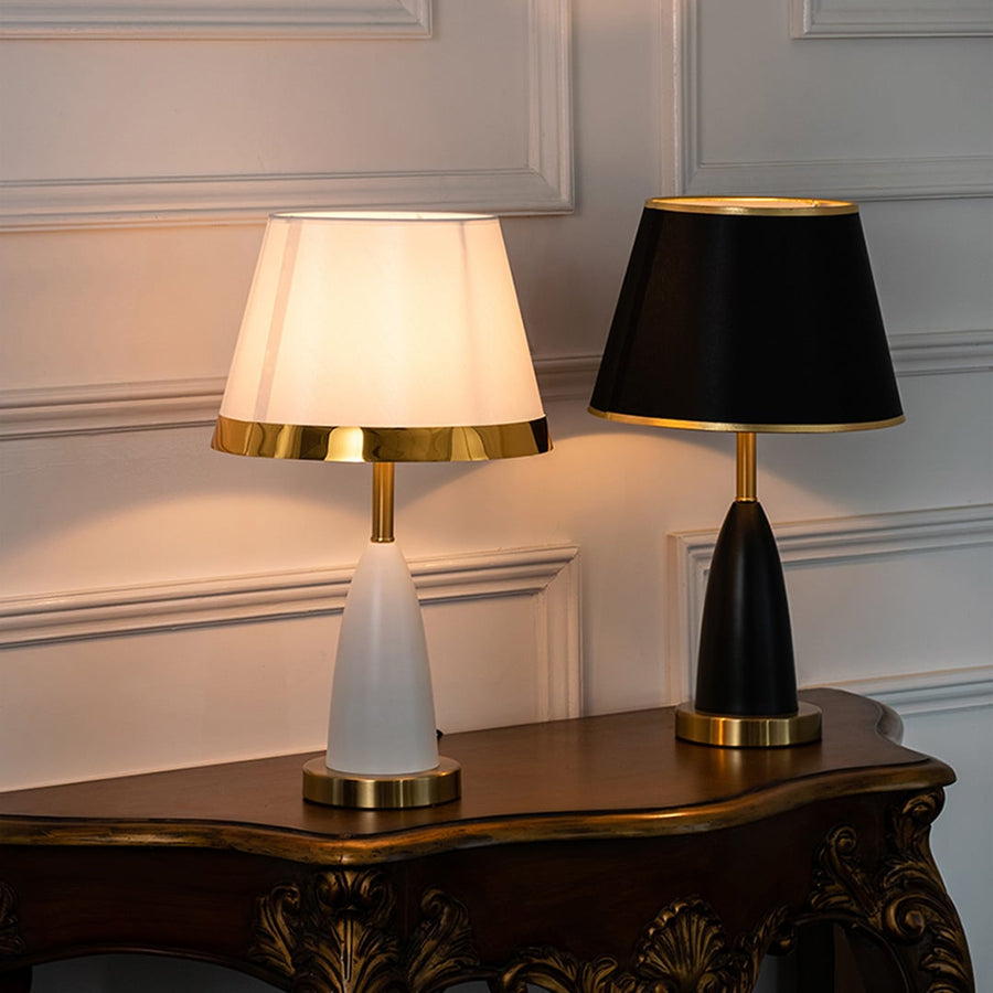 Grouped white and gold table lamp styled with other lamps for coordinated modern luxury home interior design table lamp.