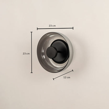 Black smoked glass wall light 23 cm round shown with size details perfect for contemporary interior wall lighting.
