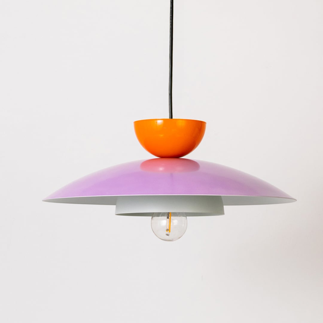 Multicolor metal pendant light with bulb off shown on white background for modern kitchen dining and living room decor.