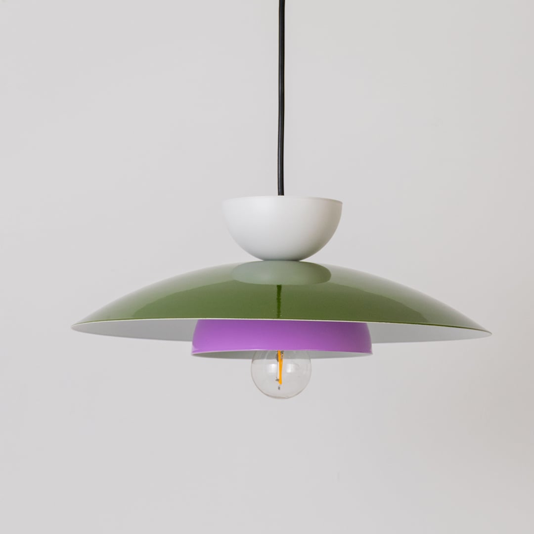 Multicolor metal pendant light with bulb off shown on white background for modern kitchen dining and home decor.