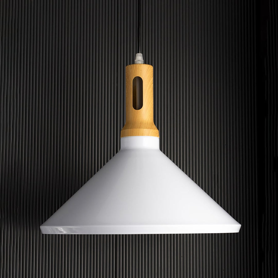 Modern pendant light with white metal cone shade and gold holder shown unlit on black background for contemporary interior ceiling decor.