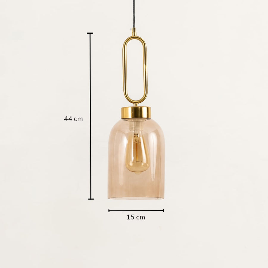 Glass pendant lamp measuring 44 cm in height and 15 cm in width designed with metal detailing to bring a modern yet classic aesthetic to interiors.