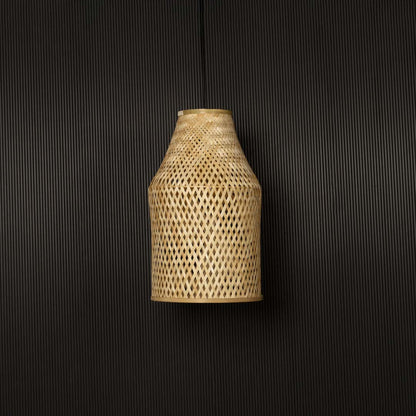 Bamboo pendant light bulb off on black background with tall cylindrical wicker shade design for rustic interiors.