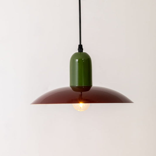 Green and burgundy metal pendant light with warm glow for kitchen island dining room ceiling decor.