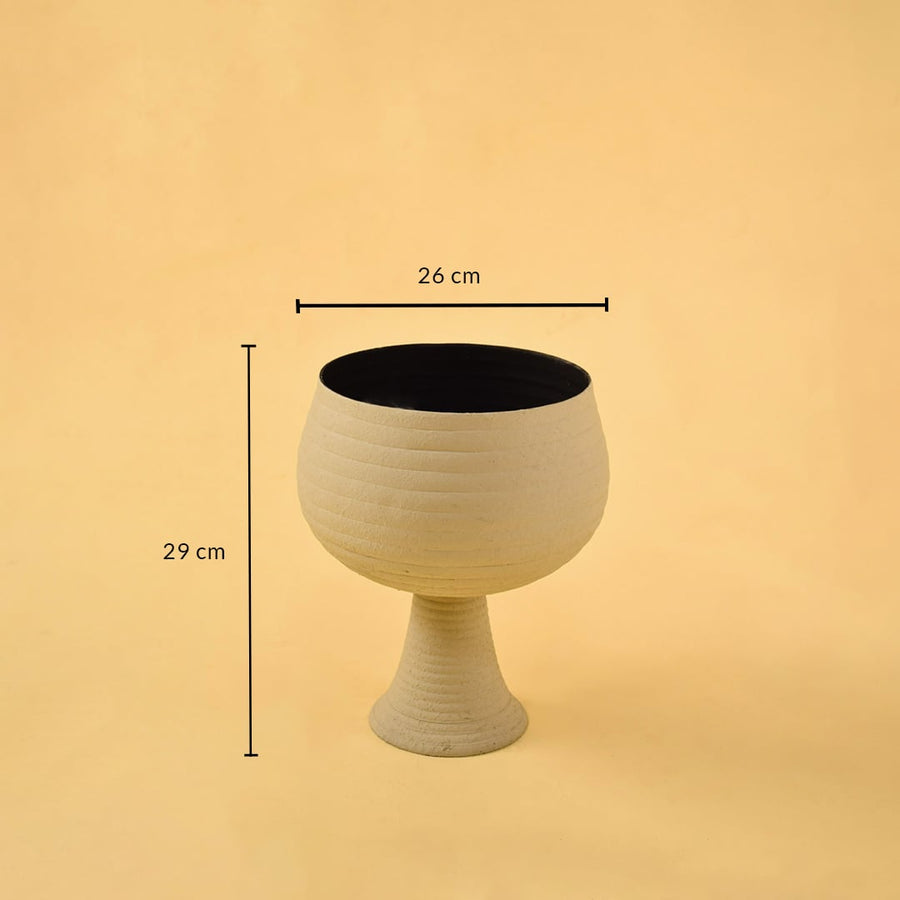 Cream metal pedestal bowl decor with width 26 cm and height 29 cm shown clearly for accurate size reference.