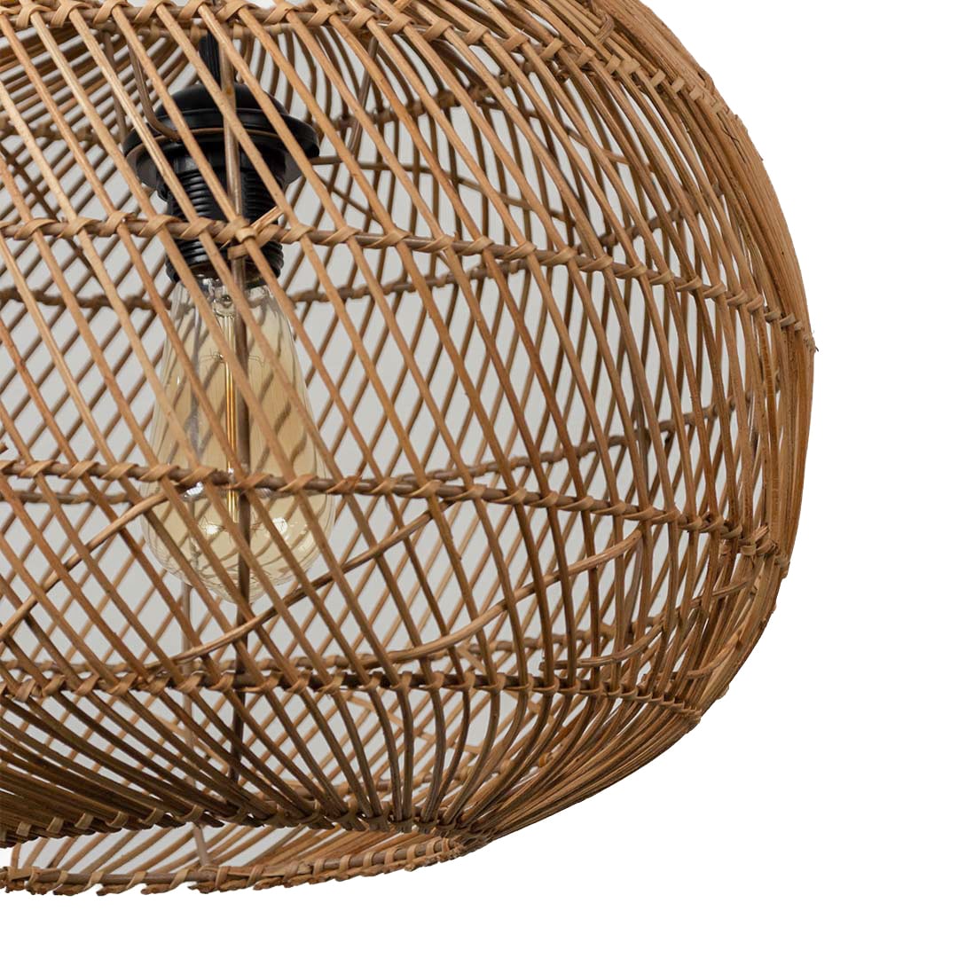 Closeup of round rattan pendant light highlighting detailed weave and organic natural rattan material.