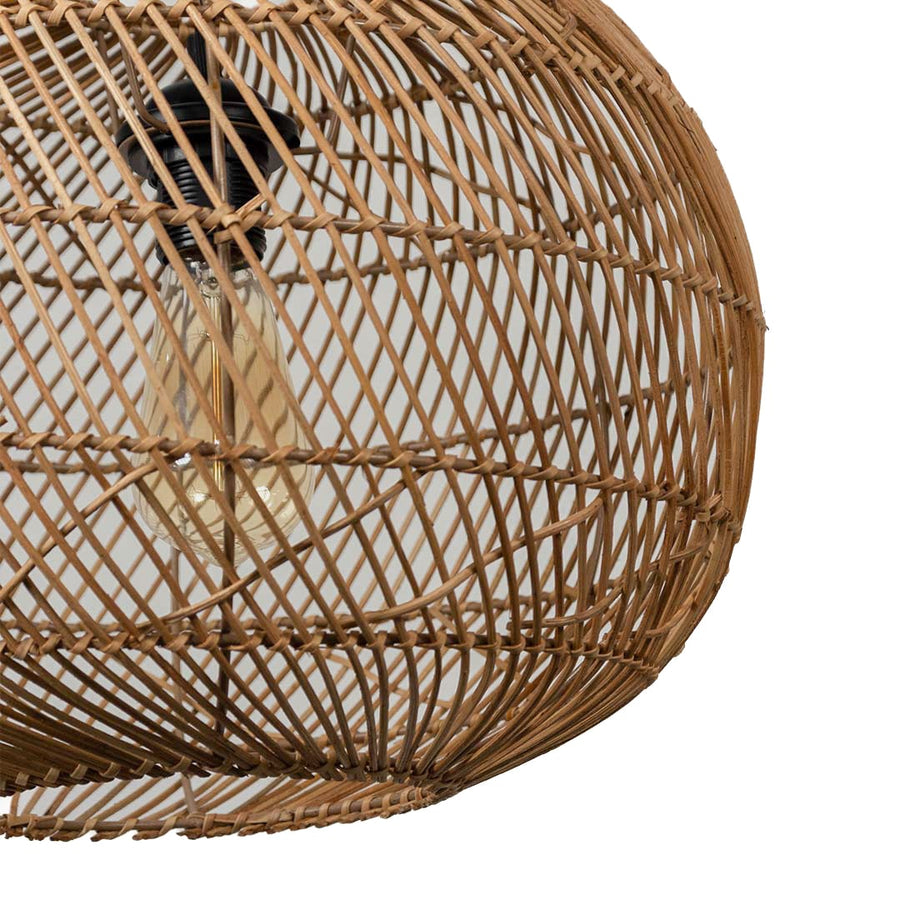 Closeup of round rattan pendant light highlighting detailed weave and organic natural rattan material.